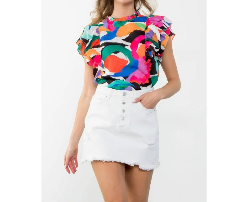 Effortless Style, Endless Impact Flutter Sleeve Printed Top In White Multi